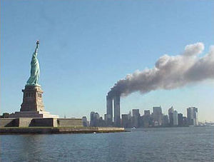 300px-National_Park_Service_9-11_Statue_of_Liberty_and_WTC_fire.jpg